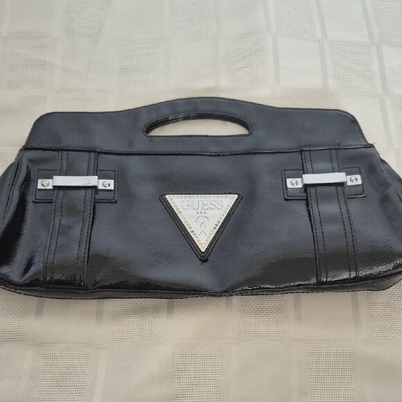Guess Clutch Black Handbag with Silver Accents - Picture 3 of 16